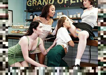 Four beautiful young lesbians licking in the cafe