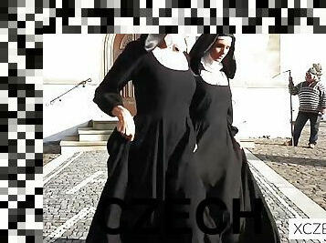 Magnificent nuns enjoy each other beautiful bodies in the church