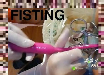 Beautiful Female Surgeon With Surgical Gloves Fisting