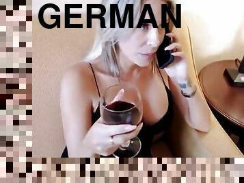 German MILF drinks red wine and sucks big dick