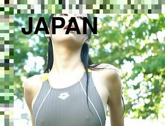 Japanese babe in swimming suits roams the city at night
