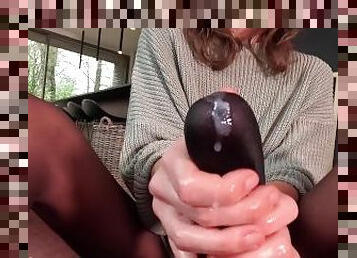 Handjob using black pantyhose on his hard cock