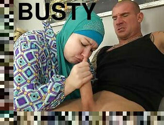 Busty bitch in hijab has a hard cock