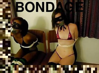 Two superheroines bound & gagged