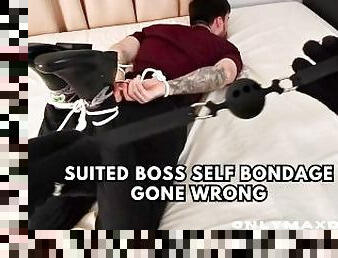 Suited boss self bondage gone wrong