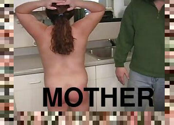 Spanking mother in the kitchen