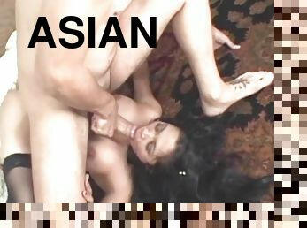 Asian in stockings and garter belt fucked