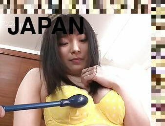 Japanese girl masturbates with a sex toy