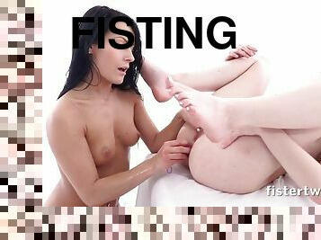 Deep fisting lesbians with anal toys