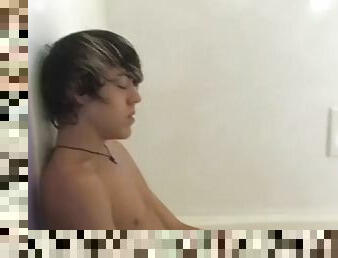 Cute twink Tristan Tyler masturbates solo in the shower