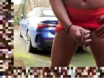 Amateur shemale Kellycd2022 sexy milf peeing in her skirt and masturbating her sissy cock and cumming in the driveway