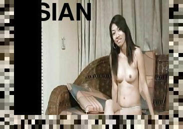 Asian filmed stripping and sucking a dick