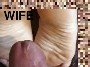 Sexy footjob from wife. Masturbating over feet.