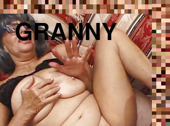 Hot granny is giving a deep sloppy blowjob