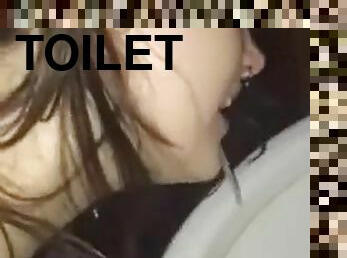 Whore licking toilet