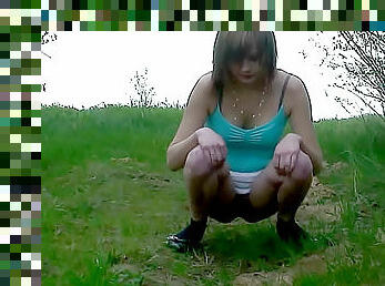 Squatting and pissing pretty girl