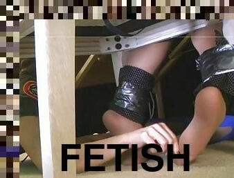 Tickling the nylon under the desk