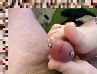 Foot job on pierced penis