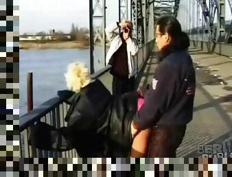 Girl walks on the bridge to have public sex