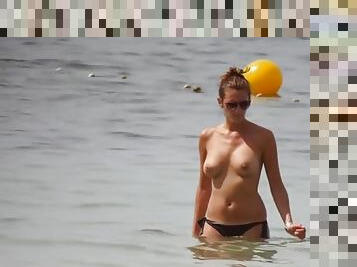 Nice topless beach day with a big boobs girl