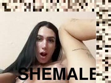 Shemale sticks dildo in ass