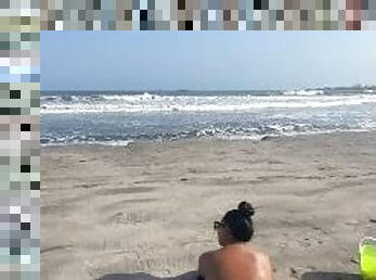 recording the best asses on the beach.