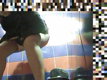 Cute babe is peeing on the camera