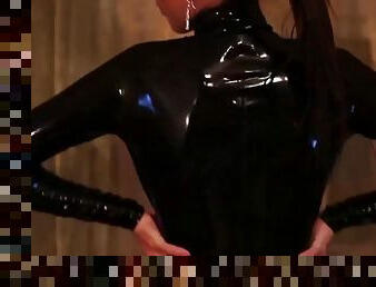 A latex girl black latex ... thigh high boots pac