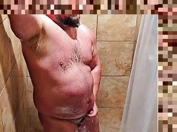 Husband takes a shower at the gym