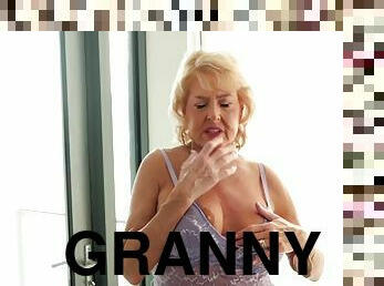 Our oldest GILF returns, so she shows her tits and touches her old pussy.
