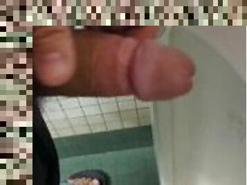 Risky Wank:  horny hung bear jerks in a public university restroom, leaves sticky cum