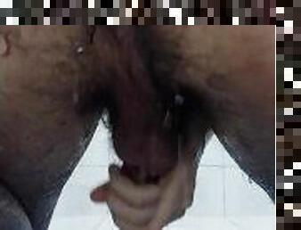 Hairy men showing his ass while taking a shower