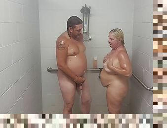 Husband and wife take a quick shower