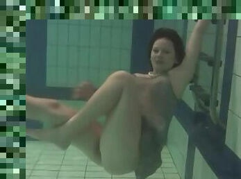Lingerie looks lovely on girl swimming in the pool