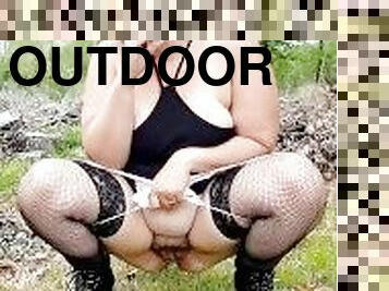 Sexy white girl peeing outdoors