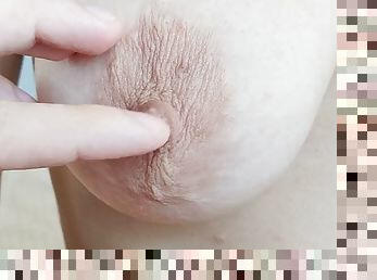 Extreme close up nipple play