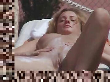 Mature blonde filmed secretly in the garden