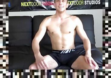 Solo jock enjoys stroking his cock while watching porn