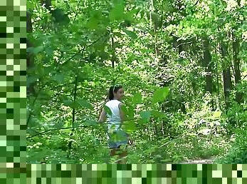 Teenager pees in the woods