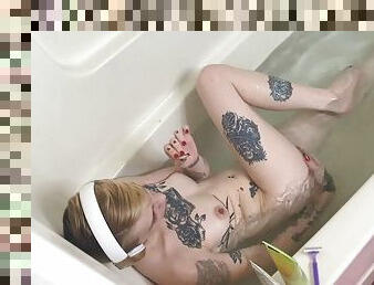 Tattooed MILF on camera in bathtub POV
