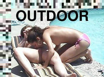 Two cute teen girls in 69 position while fucking in outdoor pool