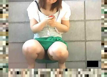 Asian amateurs caught upskirt outdoors